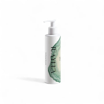 Tuaylla Purifying Mousse cleanser bottle with light foaming texture